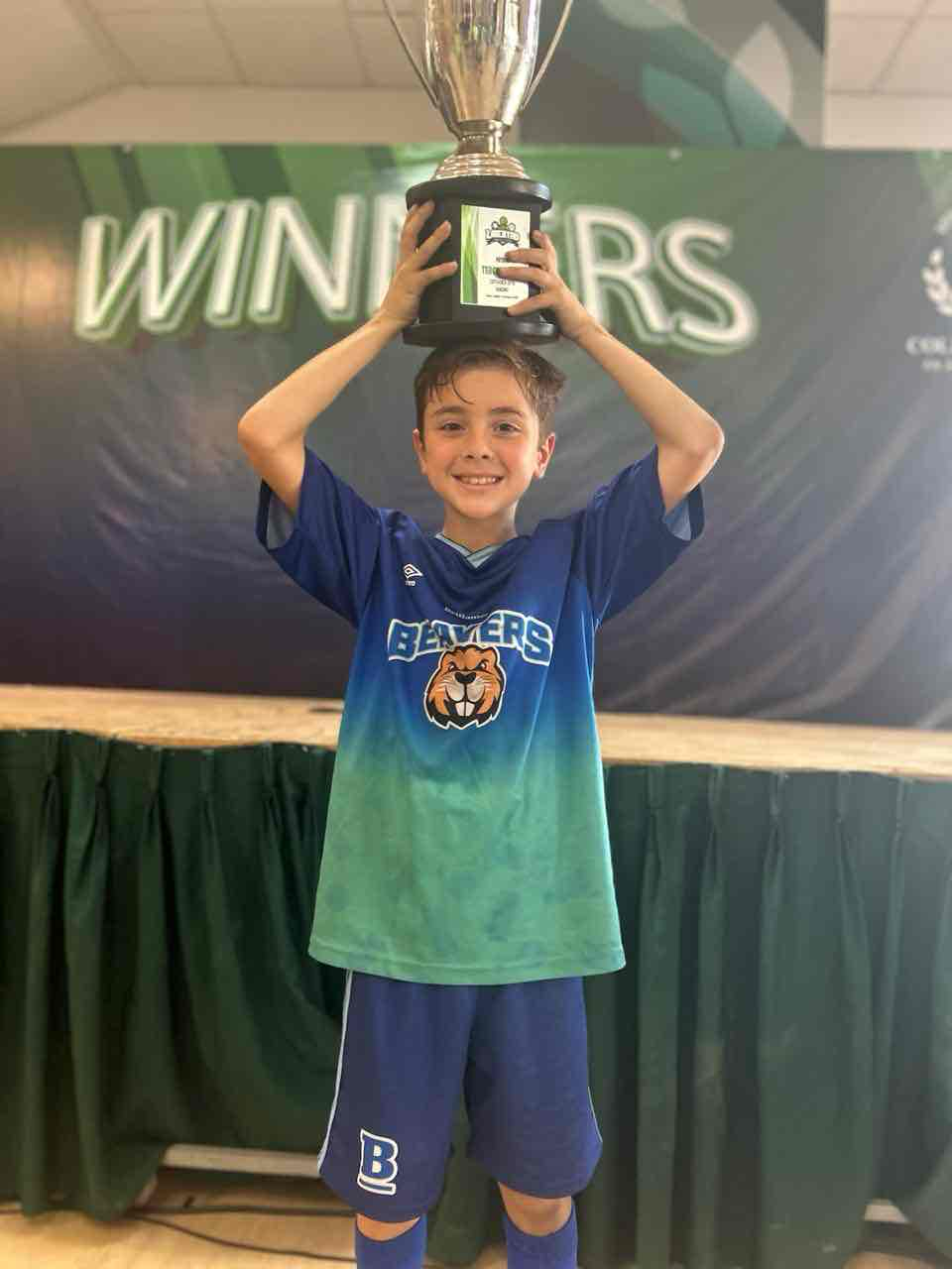 Soccer Player Holding Trophy free 3D printable STL