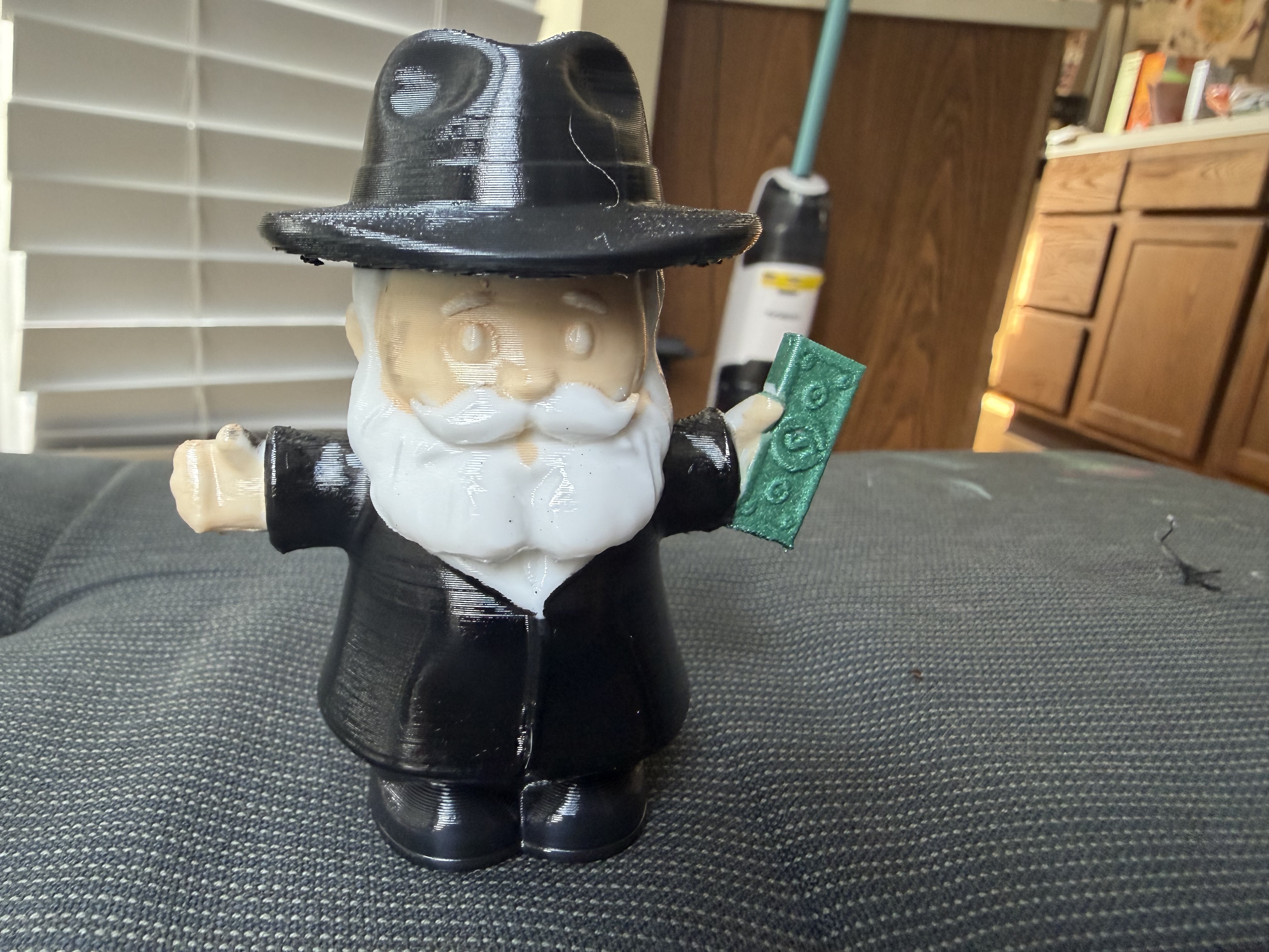 Old Man Figurine with Money printed by Maker F254