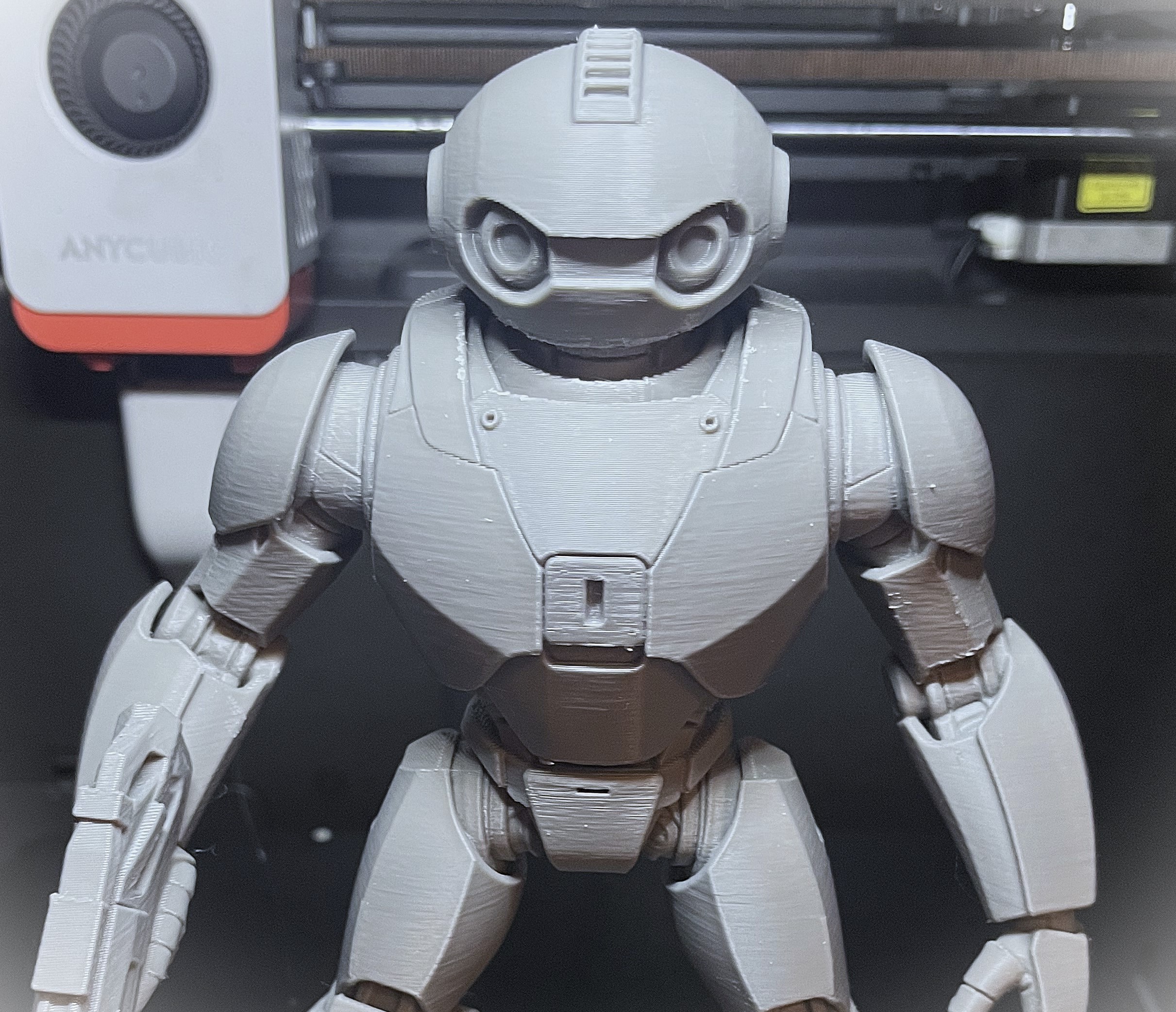 Futuristic Combat Robot Figurine printed by Fron…
